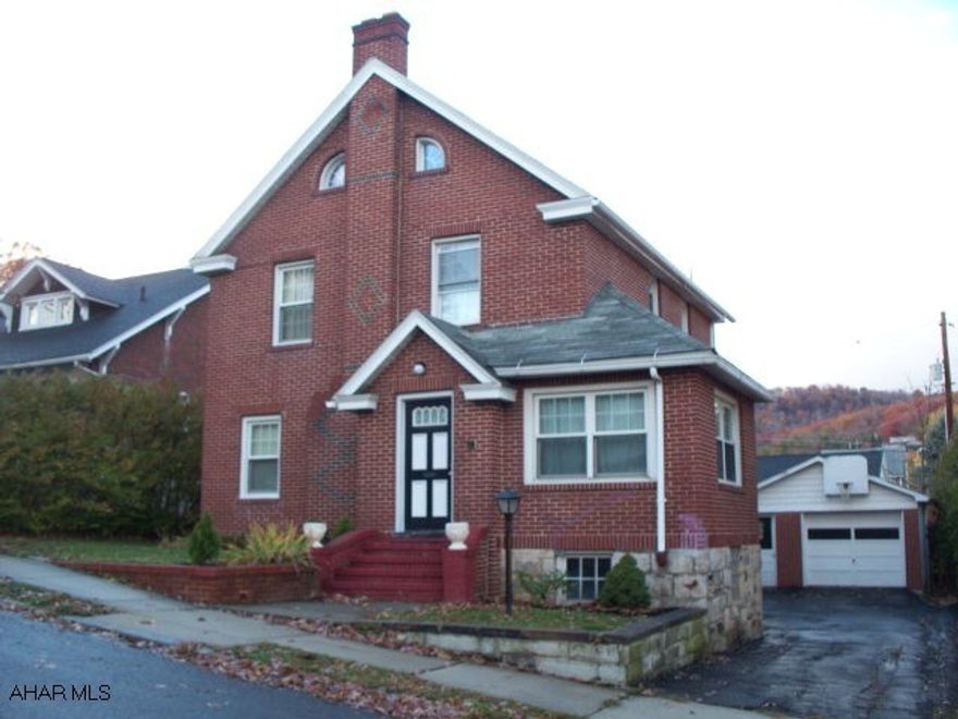 Solid brick home. Brick fireplace. Detached 2 car garage. Older gas boiler.