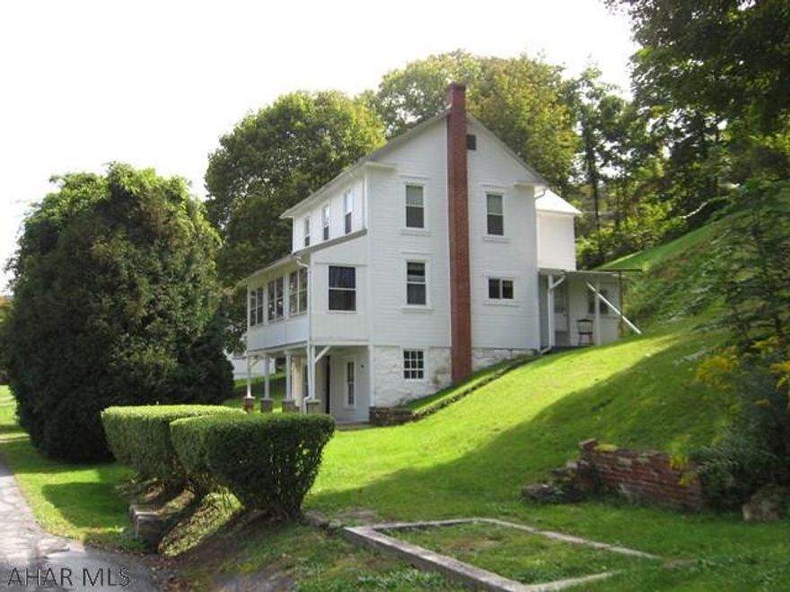 Enjoy the cozy atmosphere offered in this very affordable home that has been completely remodeled and ready for it's new owners.  Relax on the enclosed sun porch after a long day and enjoy the privacy the evergreen trees offer in the front.  Don't wait to see this one!