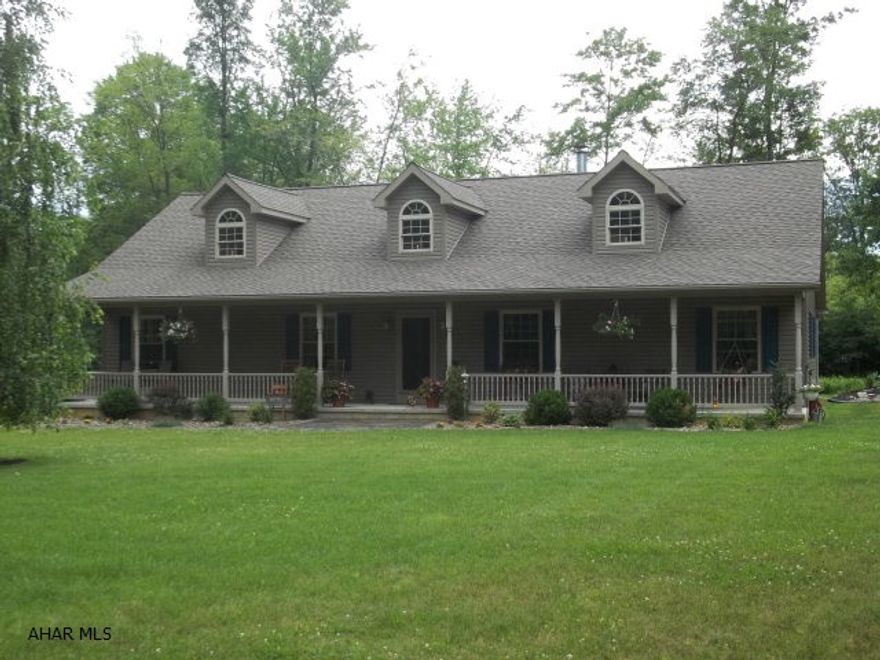 Beautiful custom built ranch on 5.7 private acres in the Northern Bedford School District. Split floor plan with three bedrooms on one side of home with the Master on the opposite side, large rooms with 3/4 ash flooring, natural woodwork, radiant heat in the floors, Unico central air system, 2 zone heat,  4 BR, 2 BA, 3 car attached garage, and 3 car detached garage, beautiful landscaping, pex manifold water system, amazing rec room on lower level, gorgeous large front porch to enjoy quiet summer evenings.  This home really has to be seen to be appreciated. List price based on recent appraisal.