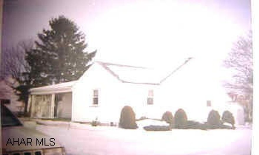 Darling, immaculate, 2 BR ranch.  New 200 amp wiring, new carpet, kitchen, windows, 2 car garage with storage.