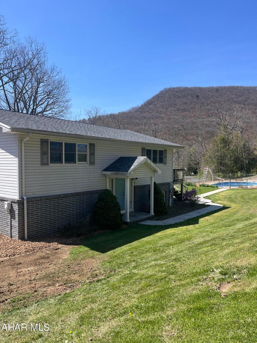 OPEN HOUSE 4/27 11:00 am -12:30 PM -BRAND NEW SEPTIC + EXTRA PARCEL OF LAND.  Brand new pool liner. This extremely well kept and move in ready 2BR home offers brand new roof (10/23) all new flooring and ready to move right in with all appliances present. Lower level offers a Bonus Room that would be perfect for extra living space. Don't miss out on the side deck for summer enjoyment while using your inground pool with BRAND NEW LINER installed and piping replaced. Pool will be open to view while touring the property. Beautiful stamped concrete sidewalk And the extra bonus...Is the 30x70 pole building to house all of your toys, tools or use for you home business if you choose!  So many possibilities to offer with this very well kept property!
New septic just installed and an extra parcel of land will now be conveyed as well. Reseeding will be complete as soon as weather permits.