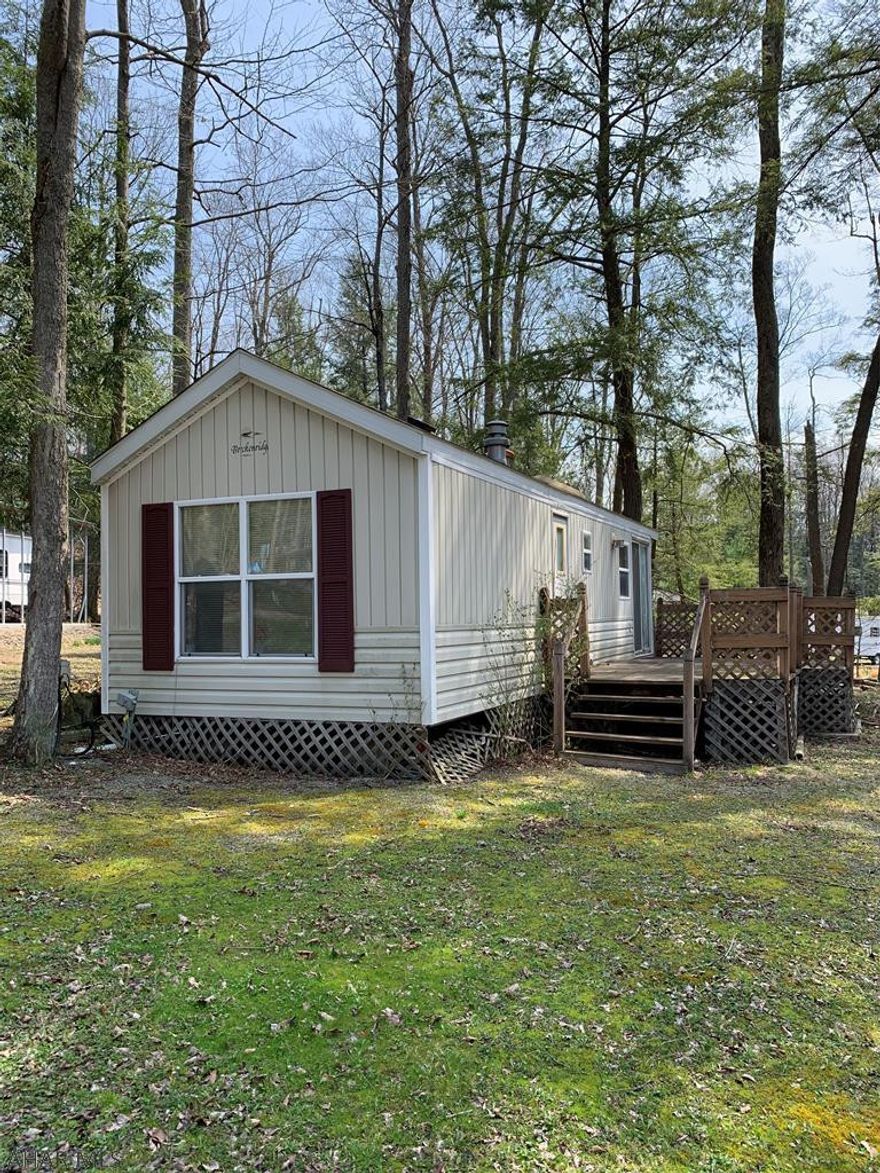 Attractive 1 BR park model on owned lot. nice deck, shed also, central air. All the amenities of Glendale Yearound. Heated swimming pool, tennis courts. Minutes from Rock Run and Prince Gallitzin State Park.