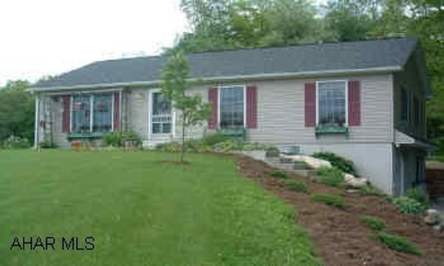 Northern Bedford Schools-3 Bedroom Raised Ranch- 2 Years old. Immaculate condition. Superior concrete poured & insulated basement walls. Radon elimination system built in. Bathroom first & second floor. Oak kitchen. Basement 75% finished. 1.17 acres which boarders State Game lands. Nicely landscaped.Restrictions apply.