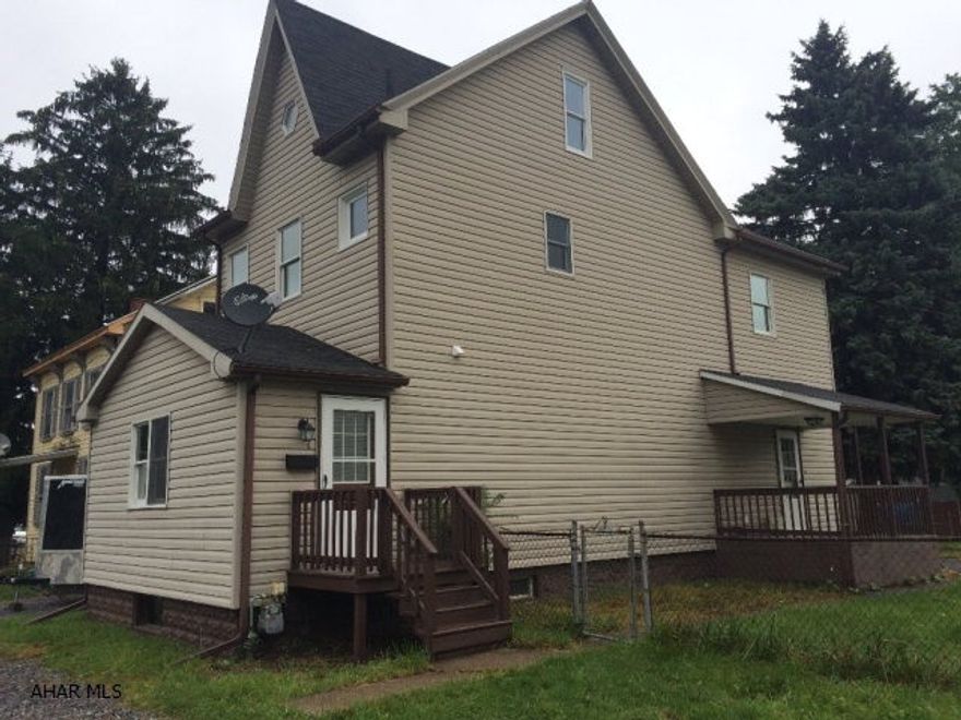 TOY TOWN - REDUCED to $123,900!  Nicely Renovated Spacious 3-4 bed, 1.5 bath 2 1/2 story on level double fenced lot with off street parking in front and back. Huge formal dining room, living room, eat in kitchen and master with attached bonus room that can be a nursery, walkin closet or office. Central air, thermopane windows, new doors, 1/2 bath and laundry on the first floor. Updated and large eat in kitchen has brand new stainless appliances. Washer and dryer in laundry area can be installed before close. Central air. Seller to consider Seller Assist with acceptable offer.