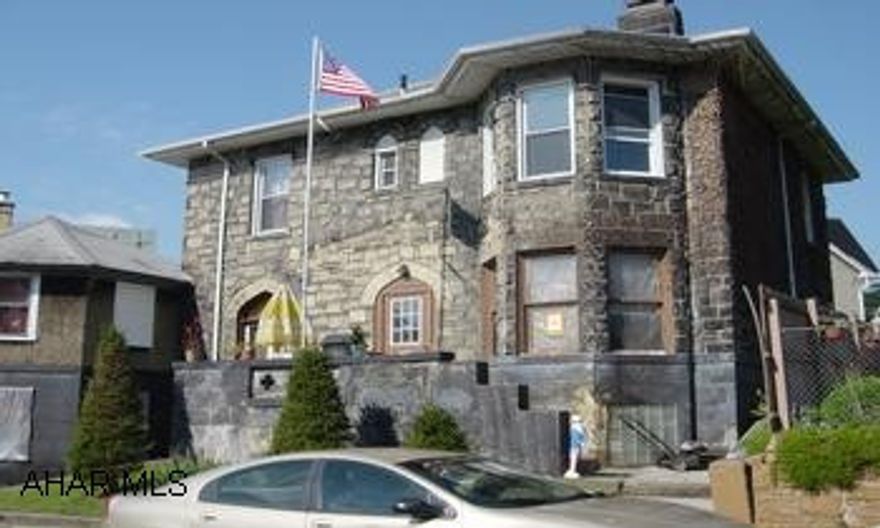 Sold AS IS - No utilities on.  Needs Roof.  Freeze damage.  Needs extensive work. CASH only Sale.  Irregular Lot - off street parking in rear.  The Department of Veterans Affairs as owner of record.  Proof of funds required for cash sale.