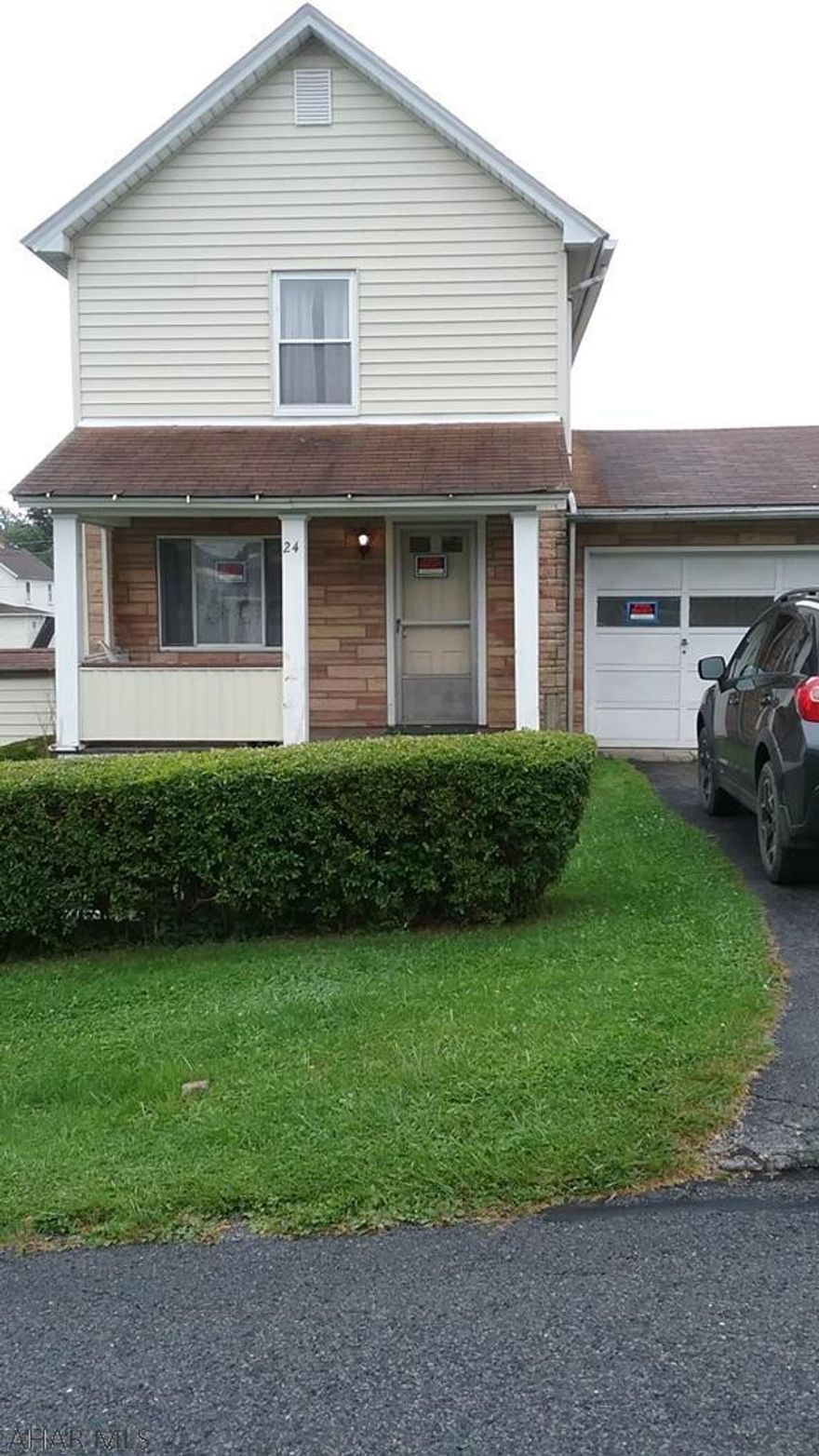 This house features all newer plumbing, most windows have been recently replaced, newer hot water tank, forced air heating. It has an attached garage, attic space, and a dry basement for extra storage space Two covered porches with a level yard and paved drive way. Close to schools. This house has alot to offer at a great price. Must see!   24 hour notice. Home Warranty included.