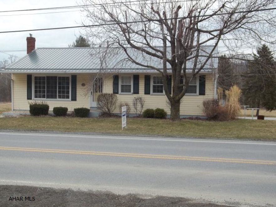 Super cute 3 BR ranch with open floor plan, natural woodwork and beautiful hardwood floors, ceramic tile and an amazing Florida Room.One floor living with laundry hookups on the main floor  overlooking the Williamsburg Recreational Park,and totally move in condition. A new metal roof, split HVAC system, new furnace and hot water tank, thermal windows make for worry free maintenance.