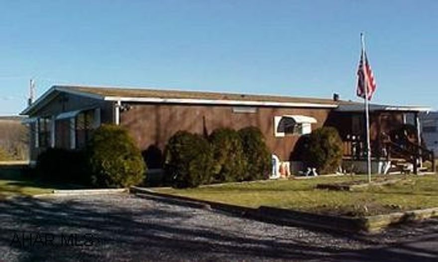 I-99 North to the Cessna Exit.  Route 56 West for approximately 1.5 miles to Hillside Drive on the left.  Follow to 5th Avenue.  Look for sign.Nicely maintained doublewide on a rented lot.  The interior floor plan offers an eat-in kitchen, living room, den, two bedrooms, two full baths and lots of closet space.  Move right in.  Lot rent is currently $230.00 per month and includes water, sewer and trash collection.