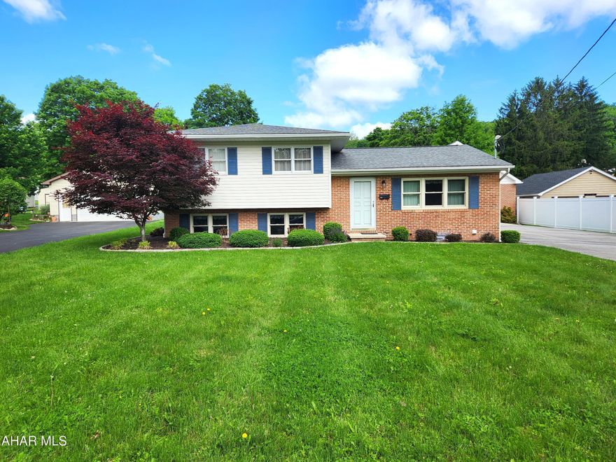 Are you looking for a move-in ready home in the Bedford Borough.  You'll want to come and have a look at this well-maintained home.  This multi-level gem features three bedrooms and a renovated bathroom upstairs, with a family room, a 3/4 bathroom and a large laundry room downstairs.  The kitchen features oak cabinets, has a built-in lazy susan corner cabinet and is open to the dining room.  The living room is spacious and the carpet was installed in 2022.  The bathroom was remodeled in 2019; it features a jacuzzo tub with a ceramic tile tub sourround and a granite vanity top.  The large family room on the lower level is partially above grade which lets in plenty of natural light.  The wood fireplace in the family room is accented by a beautiful stone wall.  The laundry room has built-in closets for extra storage space.  The bonus room in the basement is ready for your finishing touches; one wall is already framed and insulated.  The screened in porch is carpeted and is a great entertainment space.  The detached two-car garage is finished and has plenty of storage room on the second level.  The back yard is a great place for children to play; a section of it is fenced.  What are you waiting for?  This may be the one you have been looking for.  The roof was replaced in 2015 and the new windows were installed in 2021.  Buyer to verify acreage and square footage.  Taxes are face value and do not reflect the Homestead Exemption.