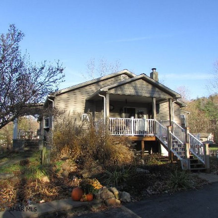 Country lover's paradise in the heart of the city! Great country look inside & out.  LR has gas fireplace, hardwood floor & ash on lower walls. DR has extended area w/wall of windows, cook stove, mix of ceramic tile & hardwood floors. Beautiful country kitchen w/tin & brick backsplash, cherry floor. Closed in porch w/2nd cook stove. 3 bedrooms on main level w/full bath plus two more finished rooms in basement. Really nice outdoor living spaces - 30x12' deck with 27' above ground pool; 33x22' patio w/fire pit & outdoor fireplace; 14x8 side porch; 11x8 front porch; 14x8 pond w/Koi, goldfish & water plants; an abundance of perennials. 3-car garage w/8' overhand. Fruit trees/berries. Muddy Run stream/two sides. No traffic-last house at end of street. Near College. 10 min to Snyders Run launch!