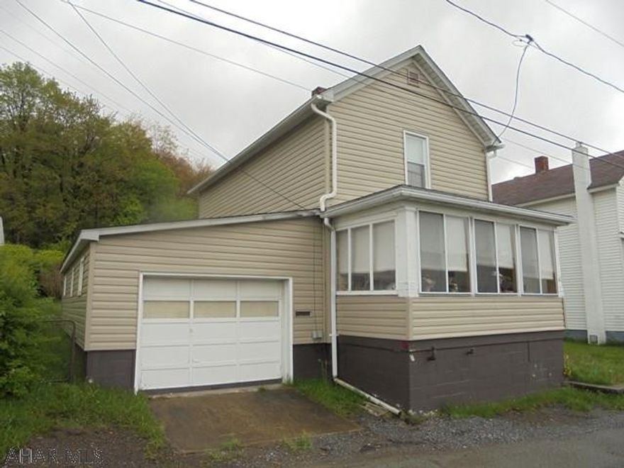 Nanty Glo- 3 BR 1 bath vinyl sided home with 1 car attached garage. Appliances included. Oil forced air heat.