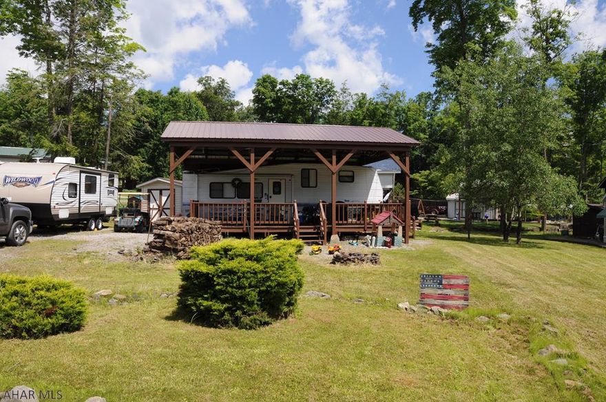 Move-in ready camper with pavilion, shed & golf cart on a double lot campsite located inside Glendale Yearound, a gated recreational community. Conveniently located next to Prince Gallitzin State Park and Glendale Lake. Motivated Seller - Bring Offers!