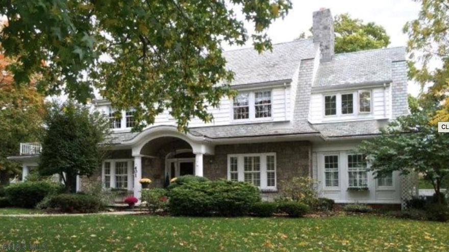 Enjoy the stunning architectural appeal of this prestigious home located in the quaint town of historic Bedford. One can only imagine the magical feeling one gets when entering this impressive home.  From the incredible moldings that surround french doors and large windows, to the sunroom flooded with an abundance of natural light.  Cooking is a joy in this bright and modern kitchen designed to enhance the historic nature of the house.  No detail has been overlooked in the professionally designed makeover that will impress even the most discriminating buyer.  Enjoy a redesigned master suite with private retreat and convenience of a main fl laundry room.  Stunning both inside and out!  Don't miss this home, it is really that impressive!