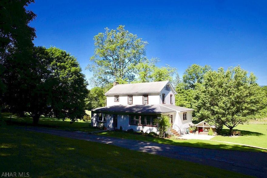 Outstanding country setting with incredible views! 2 story home with 3 bedrooms, 1 1/2 bath, large garage and barn in excellent condition. Woods, creek and fencing for hunting, fishing and livestock. Ideal for cattle or horses. Hardwood under the carpet in dining room, living room and 2 bedrooms. First floor laundry. New furnace. Move in ready and so peaceful!