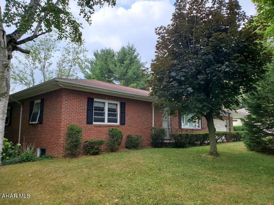 539 E. 7th St, Bellwood. Great, brick ranch home, 2 car attached garage, spacious breezeway, large corner lot, 0.55 acres w/matured trees. Finished basement area, 2 BR, 1.5 BA, gas hot water heat, wood burning fireplace! Priced to sell!!