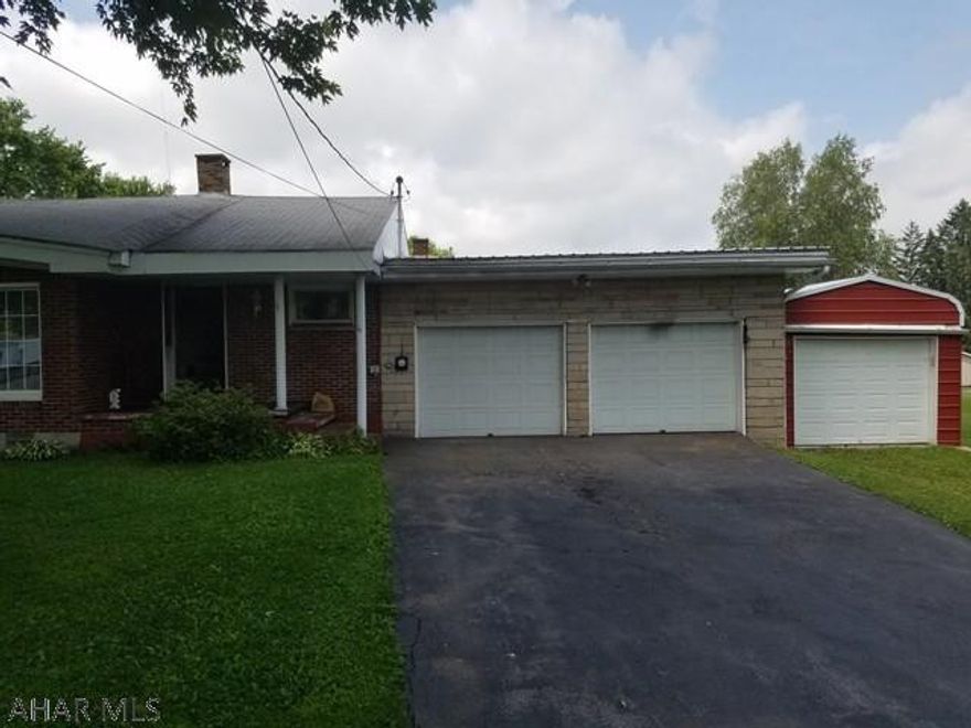 3 bedroom 1 bath all on one level with a lot of potential. Hardwood floors. 2 car garage, Sun porch, all on a 1/2 acre, in a very quiet neighborhood.
