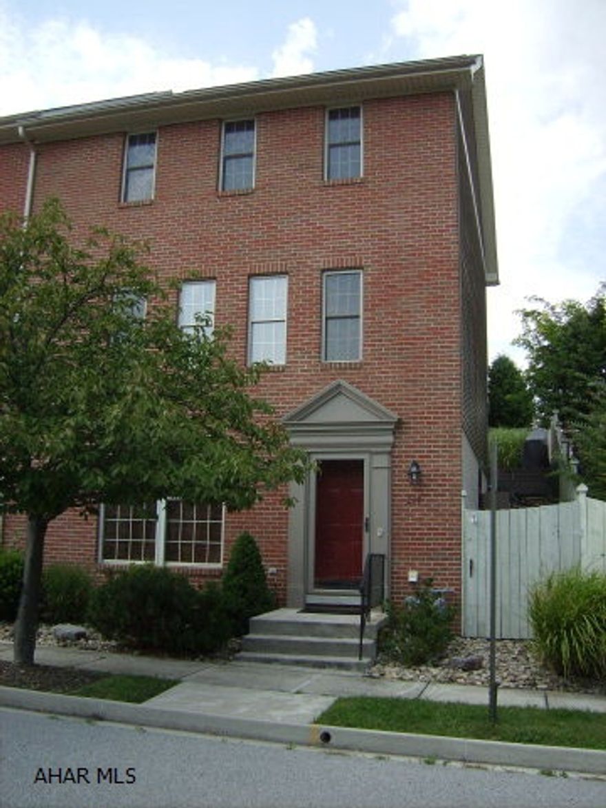 Beautiful end unit townhouse - Pristine condition - + 2 car garage, quiet neighborhood, extra outdoor space @ side. Large rear deck w/awning LR, DR, Fam Rm, Kit, 2.5 baths, 3 BR's. Appraisal on file. High end light fixtures throughout.