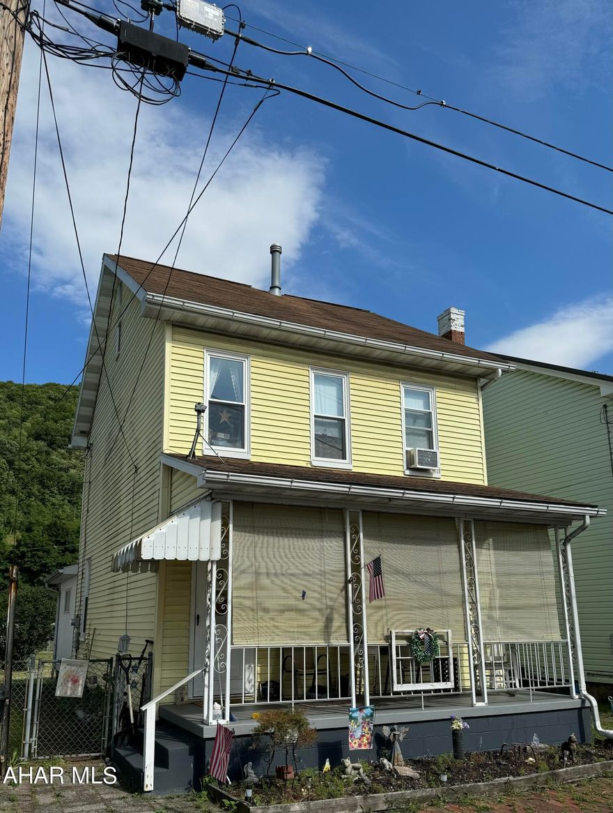 Cozy 3 bedroom, 2 bathroom house with first floor laundry.  Attic is finished and can be used as a bonus room.  Fenced in yard will be great for the pets.  One car garage and shed will be great for storage.  Off street parking for at least 2 vehicles.  Why rent when you can own your home for the same payment.