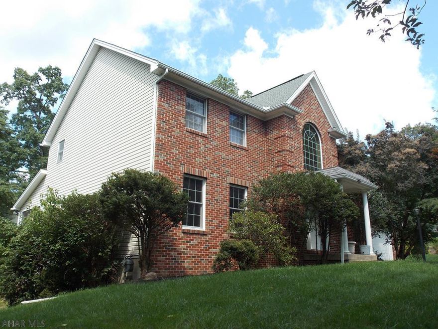 Buyers - this is your chance to own a large 5BR/3.5BA home in the desirable neighborhood of Sylvan East.  This home has a full finished basement that would be a great in-law- suite plus 4 garage spaces.  The basement includes a 3/4 bath and laundry, a kitchenette, family room and a room sellers used as a guest room  (the egress is in the family room).  The kitchen and family room are wide open for large gatherings and there is a bonus room on the first floor that was used as an office but would also be a great play room.  This home has a Hollidaysburg address but is in the Altoona School district side of Sylvan East.  Don't wait, call for your showing today!