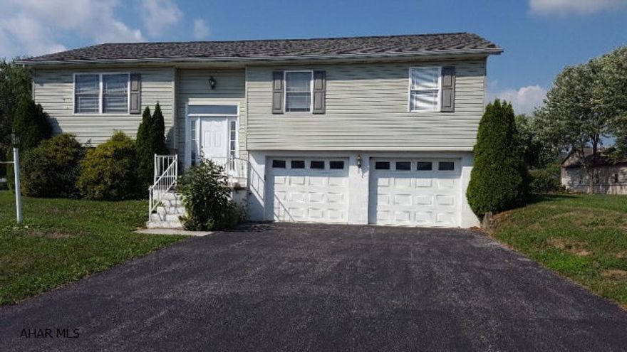 Great 3 bedroom, 2.5 bath bi-level home in a beautiful neighborhood. This home has new hardwood floors and carpet throughout, two car integral garage, deck, and much more! Situated in the Helsel Development in the Spring Cove school district, it is conveniently located. Maintenance free vinyl exterior, this home is bright and spacious and just waiting for you to take a look!