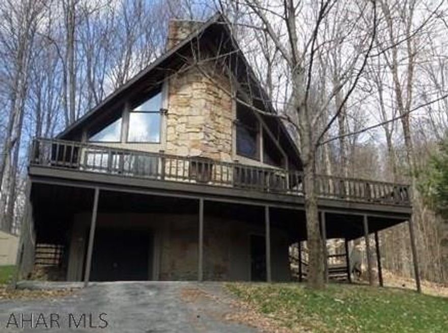A-frame with loft area and open floor plan, stone fireplace, wrap around deck, shed. Property was built prior to 1978 and lead based paint may potentially exist. Yearly HOA dues $980; Transfer Fee $945 Re-Sale Fee $45
