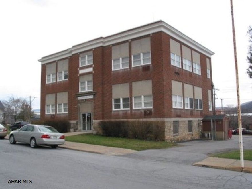 Solid bldg. presently occupied by American Red Cross. Former public school bldg. HVAC on all levels. Great office space - lots of parking.
