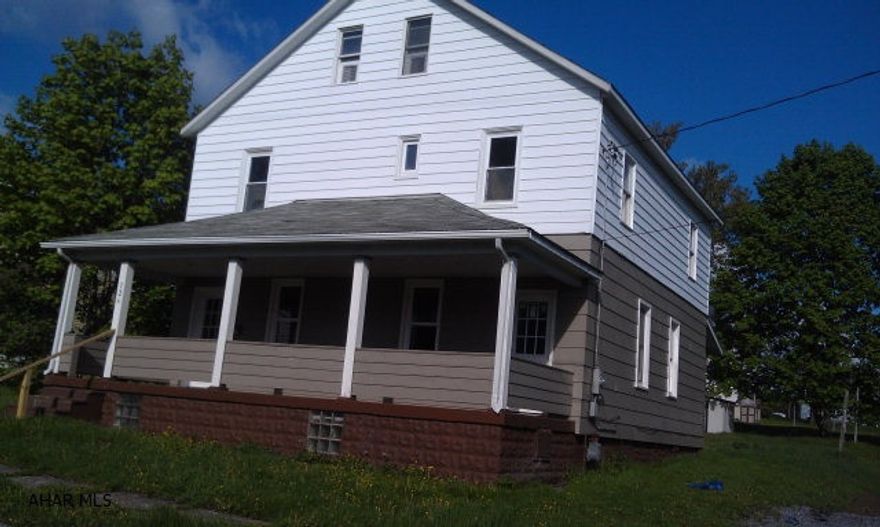 A must see! This home features ceramic tile,laminated flooring    Double lot    2 staircases  large rooms, like new kitchen, this home has so much to offer Must see inside to appreicate .