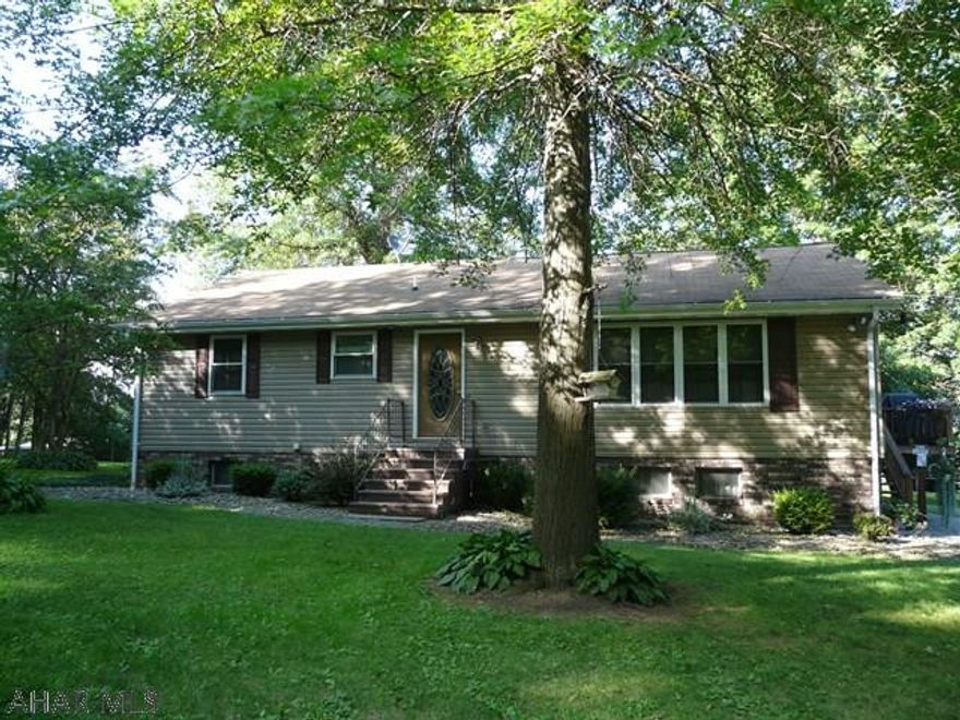 Awesome split entry home on 13.2 acres all located in a spectacular setting! A few minutes from Prince Gallitzin State Park, this property has detached workshop, carport, storage sheds, shooting range and approx 3,000 christmas trees. The home has been well maintained with beautiful oak kitchen, large dining room, living room, two bedrooms and 1.5 baths on the first floor. Basement is finished including family room with pellet stove and two bedrooms. Great country setting near St Augustine.