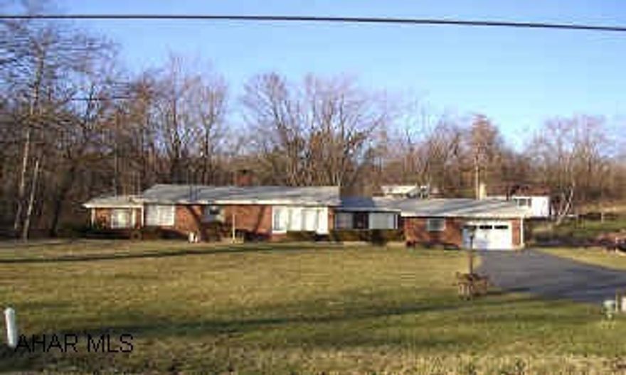 ONE STORY BRICK WITH ATTACHED GARAGE. VERY CLEAN TWO BEDROOM AND OFFICE.  ONE STORY WITH ATTACHED GARAGE.  NEW ROOF, FORMAL DINING ROOM, FIREPLACE, SUMMER PORCH.  BLOCK SHED.  ONE ACRE OF GROUND.  OWNER HAD HORSES AT ONE TIME.