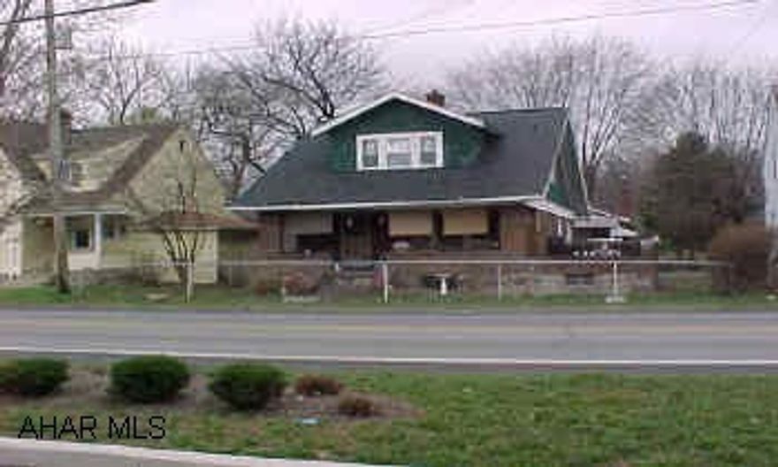 2 Story brick & cedar shake house, newer shingle roof, & double hung windows.  Open front porch.  Nice clean house and fenced yard.  Will also sell all houses in package. 2 Story brick & cedar shake house, newer shingle roof, & double hung windows.  Open front porch.  Nice clean house and fenced yard.  Will also sell all houses in package.