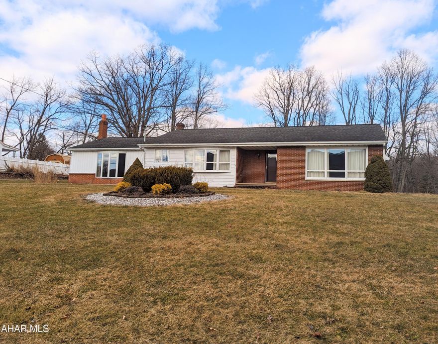 Back on the market: Bright ranch home with two car garage! 3 bedrooms, two huge living spaces, stunning hardwood floors - all with ceiling mounted mini-split heat and A/C. Oil furnace & pellet stove for back-up heat, too. HUGE windows showcase the beauty of Central PA's mountains, great interior flow, and lots of parking and yard space! Tyrone SD. Easy access to I-99. Inspection report available and title work is done. She's ready to be sold!