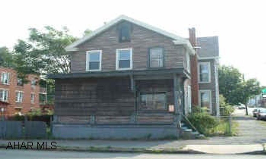 FOUR BEDROOM, 1.5 BATH FIXER UPPER ON 50X120 CORNER LOT. NEWER WINDOWS. OFF STREET PARKING. CALL JOHN DAVIDHIZAR TO SEE THIS PROPERTY. SOLD "AS IS".