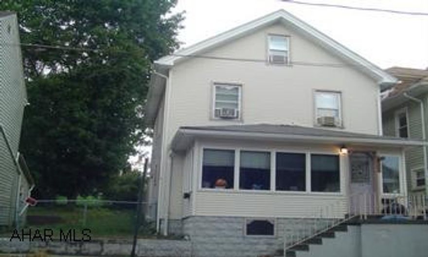 24 hour notice to show. Attic could be finished for 4th bedroom. Lot irregular.