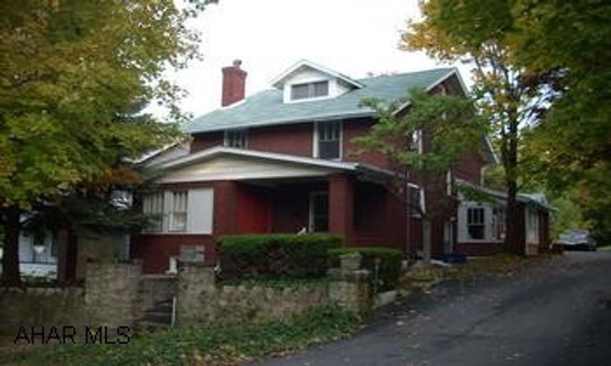 TWO STORY BRICK WITH DETACHED 1 CAR GARAGE. CLASSIC BRICK WITH 1ST FLOOR BATH AND LARGE FAMILY ROOM.  100X120 LOT WITH TREES.  PRIVATE YARD.  1 CAR GARAGE WITH ATTACHED WORK ROOM.  NEW ROOF 10/08.  ELECTRIC UPDATED.