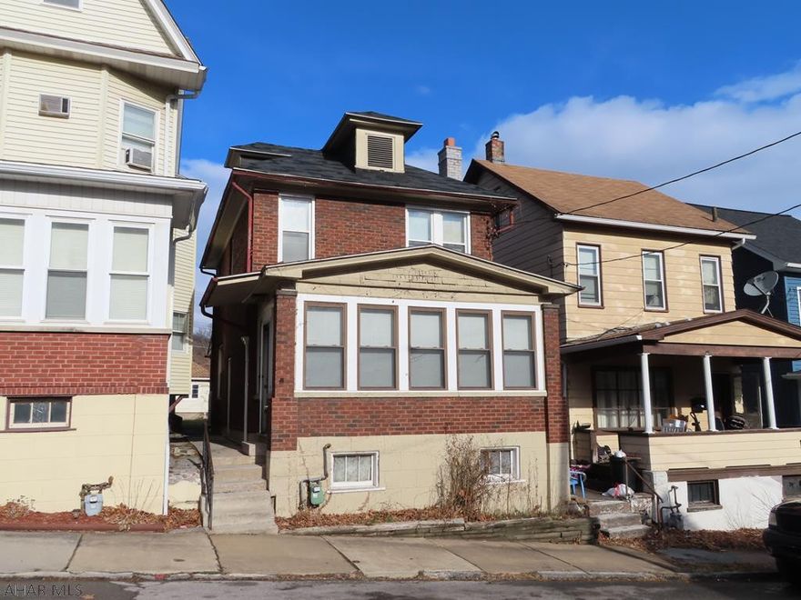 Agent Owner Property! Nice house 2 story brick home located on 21st Avenue, located within a short distance to downtown Altoona. It is a 3 bedroom, 1-/2 bath with a large sun room and a detached garage.