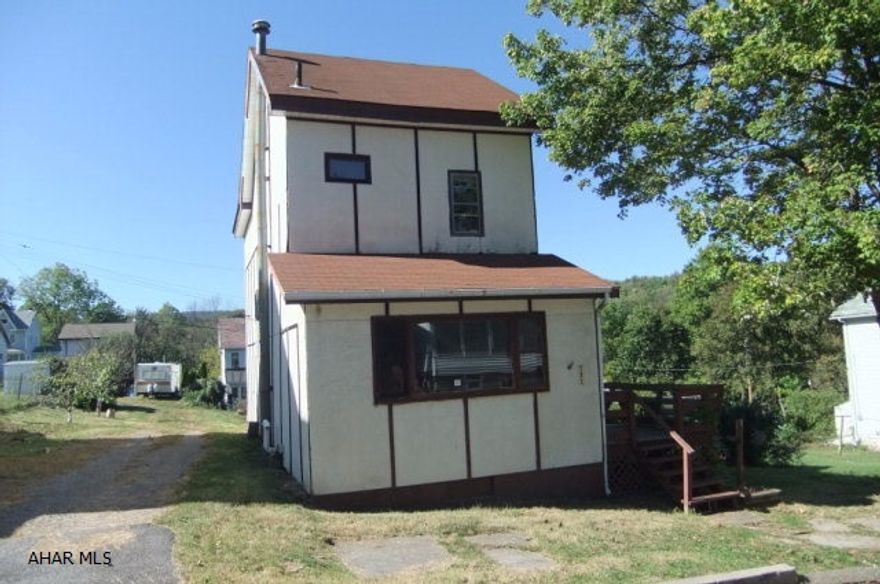 Juniata 2 story in need of major TLC. AS-IS sale. Bring offers.