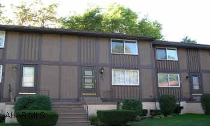 CHARMING TOWNHOUSE WITH SPACIOUS ROOMS. WOODED SETTING. OWNER IS LICENSED REALTOR.