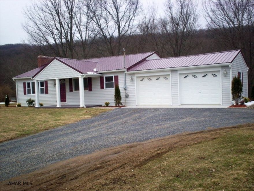 Beautifully remodeled from top to bottom, located close to town with mountain views. Lot size is 1.3 acres, partially wooded, desirable area. Vinyl sided, 50 year roof, and over 2500 square feet of finished space.  5 bedrooms, 2 full baths. Cherry cabinetry, granite counters and bath vanities, beautiful fixtures, ceramic tile in kitchen and baths. Full finished basement with family room and fireplace, full kitchen, 2 bedrooms, full bath, perfect mother-in-law suite. Laundry connections on each floor. Quality workmanship throughout, an outstanding home.