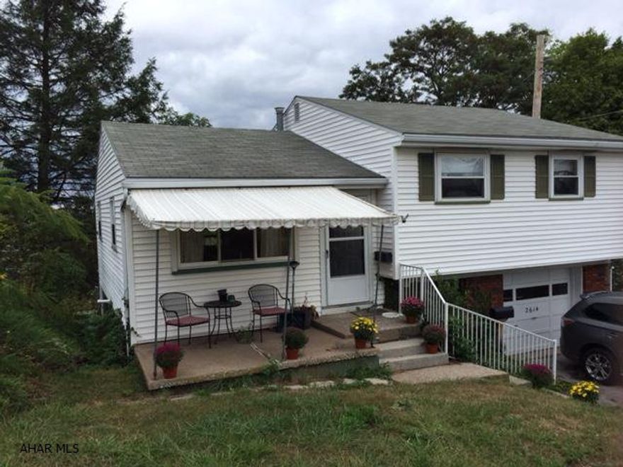 Nice, well kept property with lots of potential to customize.  Small front yard with bushes provides privacy as well as a fenced back yard.  Electrical system was recently upgraded to 200 amp breakers. Seller is currently in the process of repainting and having carpets removed and original hardwood floor will be refreshed. Bedrooms have hardwood floors.  Lots of storage space in bedrooms with each room containing double closets.  Large work bench area in basement.  Bonus room in basement that was originally used as a dark room.  Also has an attached over-sized one car garage. Property comes with a home warranty.