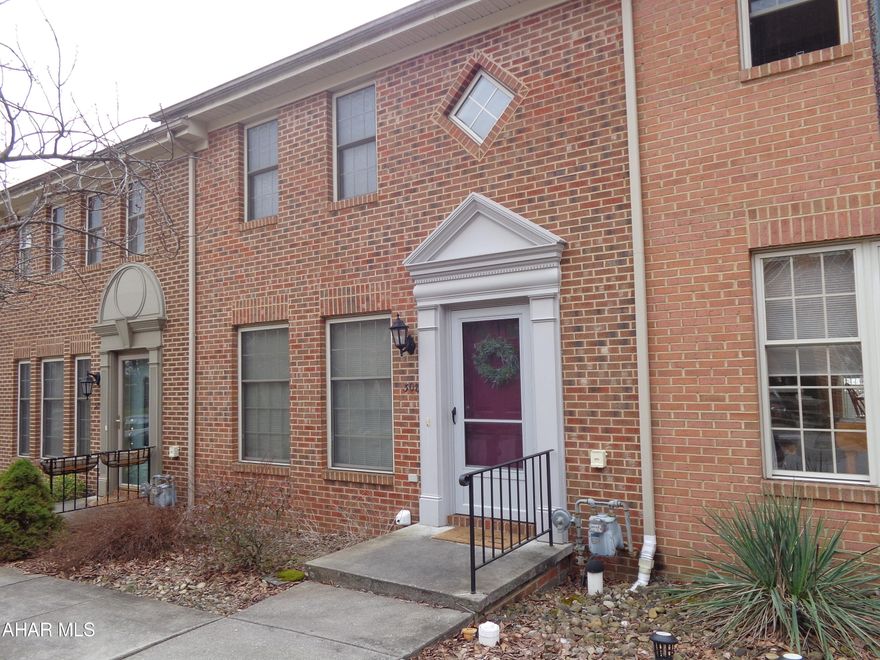 Beautifully well maintained 2 Bedroom, 1.5 Bath Townhouse.  Finished Basement, Bonus Room, deck with awning, laundry chute.   2 off street parking spaces  in the back.