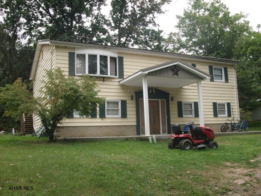 Spacious raised ranch in a quiet, secluded setting.  2400 square feet of living space includes a finished basement with large great room that includes a bar, game area, and seating area.  Basement also includes a bedroom, tool room, and a furnace room/storage space.  Upstairs you will find a formal dining room, living room, nicely remodeled kitchen and bath, and three bedrooms.  Metal roof on home is about two years old.  Very nice home.  Lot size is 134x 151. Seller wants no weekend showings