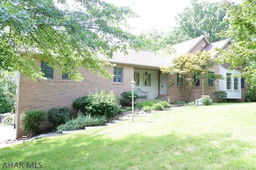 Move in Ready!!!  Updates galore including Hardwood floors, new kitchen and a re-designed master bedroom.  Bright and airy throughout...big windows and vaulted ceilings give the feeling of spaciousness.  The great room FP is the anchor of the room...double doors lead to the deck and fenced rear yard.  Downstairs enjoy winter evenings by the 2nd fireplace.  There is a brick bar, additional bedroom or office.  2 Sets of double doors lead to the patio.  Tons of additional storage in the lower level, heated garage.