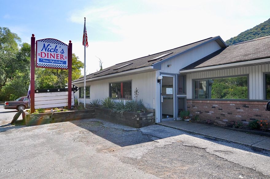 A highly visible diner/restaurant for sale right along busy Route 22 in Huntingdon, PA! This well-established business has been a premier dining spot of Huntingdon County for over a decade. Through the years, the property has been through expansions, renovations and upgrades - including security and safety systems, spacious entryway, dining room addition and an extended counter space. With a large parking lot and seating for over 125 patrons, this establishment can certainly accommodate sizable crowds. Public water, public sewer, central air and natural gas all keep the building comfortable and extremely efficient. 600 lineal feet of frontage! Lots of parking! All square footage contained in this listing are estimates based on public records. Buyer and Buyer Agent to confirm. Call to schedule an appointment to tour this exciting new opportunity situated at a prime location!!