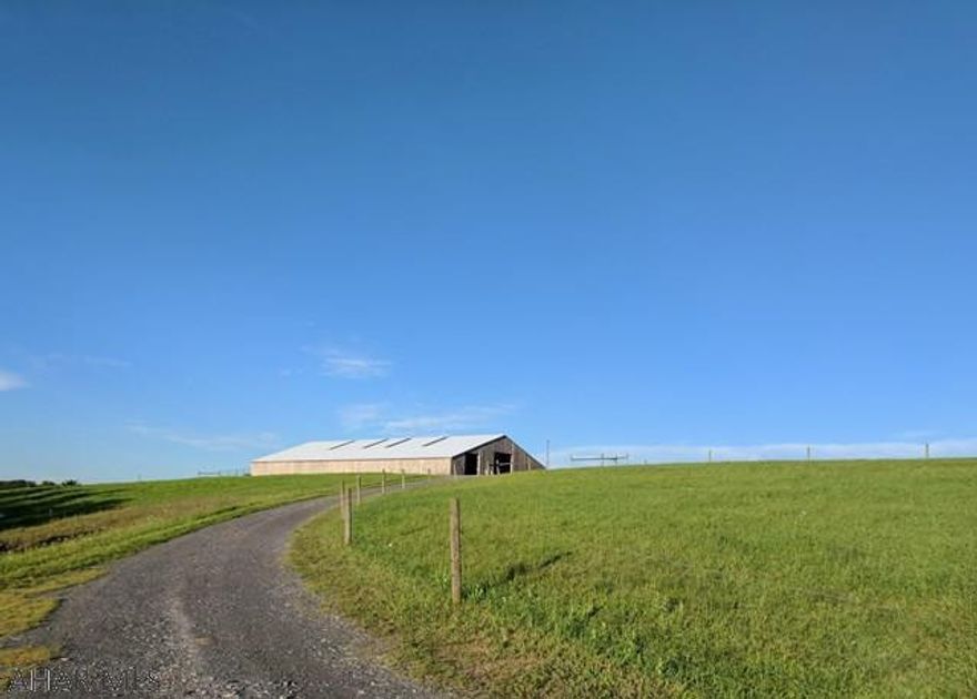 Are you looking for multiple barns and pastures on 105 acres, with possibly a 3 bed, 2 bath house thrown in? High quality fencing, fantastic views, a pond and streams, multiple machine/run-in sheds can all be found on this one property! What about hunting? Here it is! Deer, turkeys, rabbits, bear, squirrels even wood grouse call this property home. Rural life at it's finest with projects to really make the place feel like your own. So we have the newly built huge pole building with heated concrete floor system in place, and we also have a home with serious character and charm from the 1800's. The house will take some finishing, but while deciding exactly how to display the beautiful hand hewn logs in the huge living room which opens to your covered deck, relax and enjoy the view!