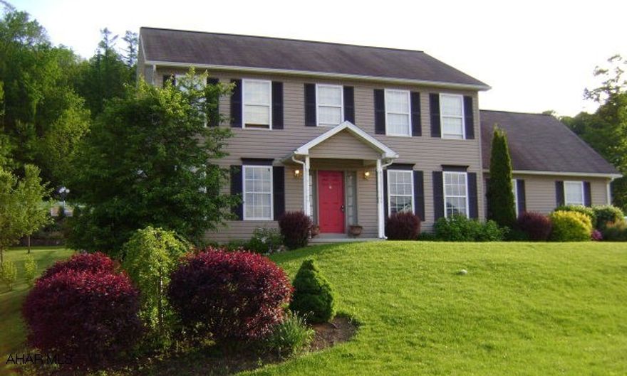 Located between Altoona and State College.  4 Bedroom 2 1/2 Bathroom immaculate and spacious 2 story.  Features large corner lot, 2 car garage, rear deck and gazebo, eat-in kitchen, family room with fireplace, full bathrooms with double sinks, & large walk-in closets.  Bellwood Schools.