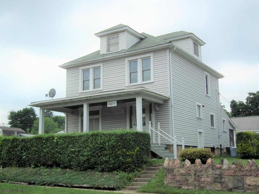 Great Area - Great space.  This 4 bedroom home is on a corner lot with screened in patio.  All bedrooms are spacious, living room is spacious, dining room has built in storage and hardwood floors.  Carport.  This home will need some floor repairs from 1st floor laundry leak but well worth the effort and TLC.