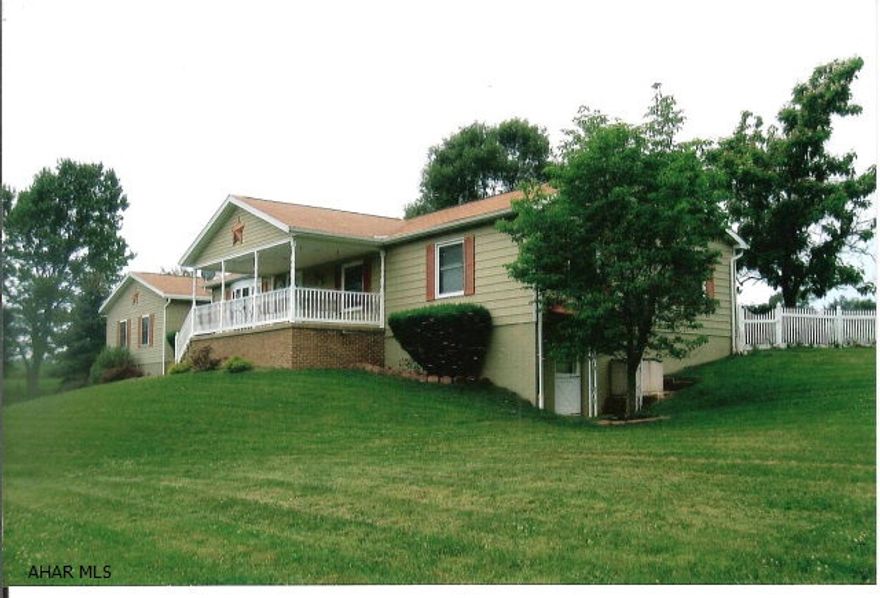 Great deal on a fabulous ranch home in Breezewood. This house has everything and more! Three bedrooms, 2 1/2 baths, lovely sunroom overlooking a fenced perennial garden. Full finished basement with large family room with brick fireplace, laundry room. Oversized attached 2-car garage with storage. A must see!