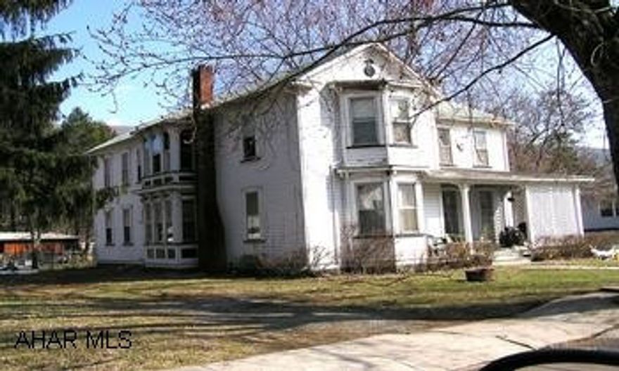 Two story, built in 1883. Good condition, near PO, bank and stores. Two story with all boro amenities. Late kitchen, family room with fireplace, half bath down and four bedrooms and full bath up. Oak trim and built in china book case. Covered front porch and enclosed rear porch. Detached garage.