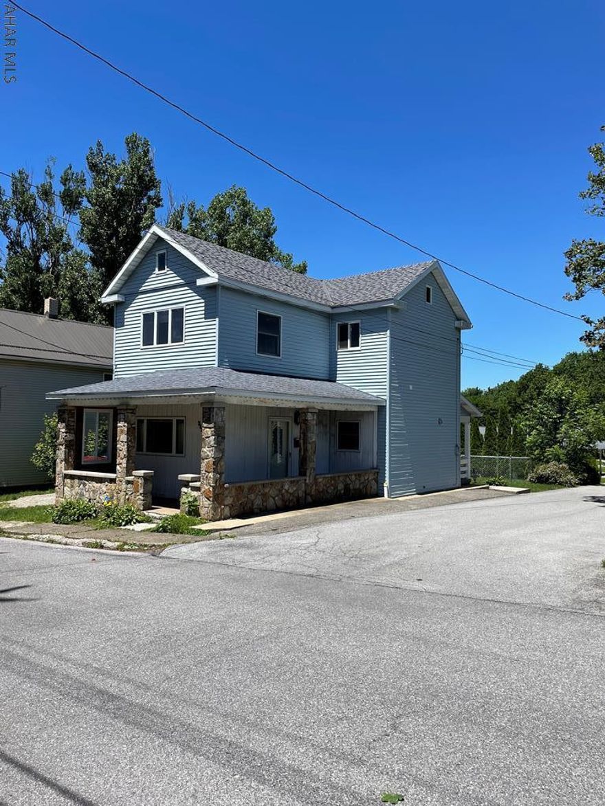 This well maintained 2 story home in Cresson Borough is within walking distance to the post office and local swimming pool.  Kitchen features a large counter top area perfect for breakfast, baking or meal preparation.  Plenty of cabinets for storage and a pantry.  Dining room is large and features a bay window.  The spacious living room can easily accommodate a sectional couch.  Upstairs there is laundry, full bath and three bedrooms.  Newer flooring in smaller bedroom and hallway.  Walk up attic is great for storage.  Put your grill on the back covered porch.  Large shed and a fenced area.  Off street parking.