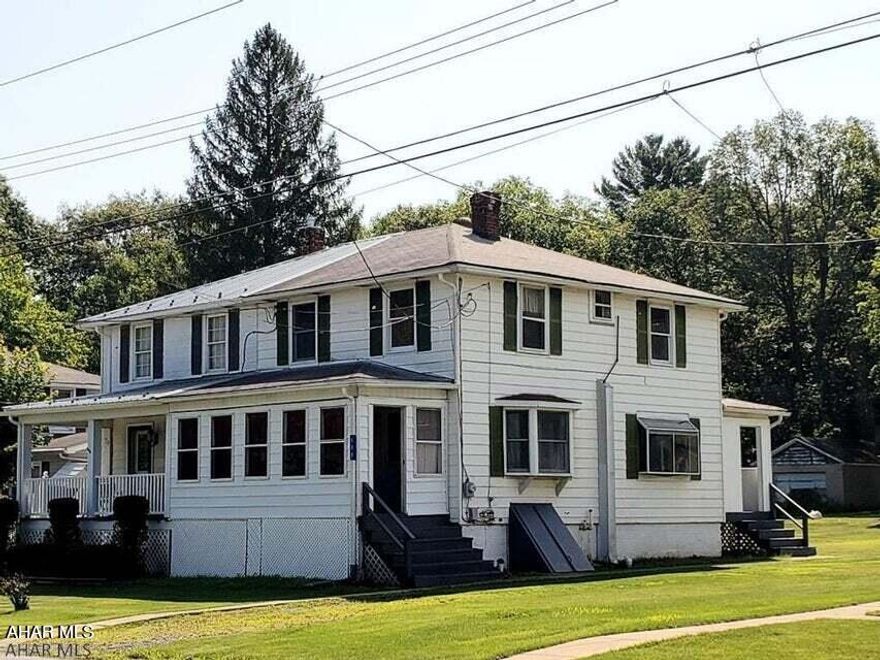 Nice 3-bedroom 1-bath vinyl-sided 1/2 of double home with large eat-in Kitchen, enclosed front porch and covered back porch. J-619